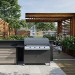 Luxury outdoor kitchen designed with a barbecue grill and cabinets in the St. Louis metro area