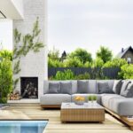 Outdoor fireplace built with comfortable seating and decking in the St. Louis metro area