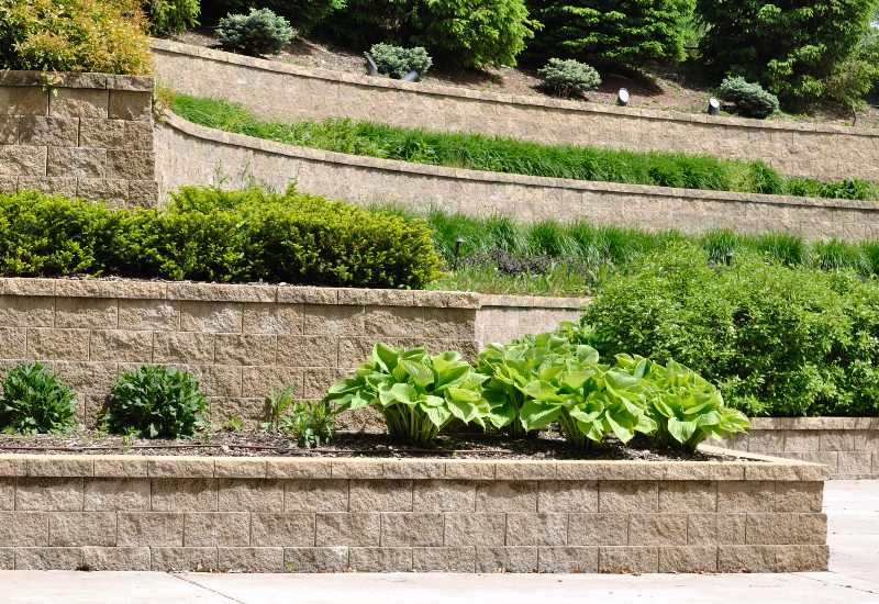 Stone retaining wall structure built to protect from erosion and flooding in St. Louis metro area